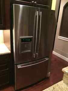 LG Stainless Steel Fridge with water and ice dispenser. 36"
