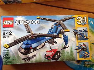 NIB Lego helicopter, plane, snowmobile