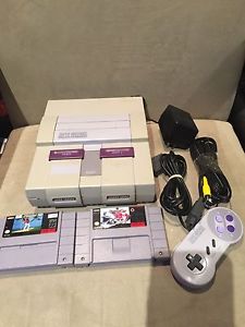SNES SUPER Nintendo system with 2 games