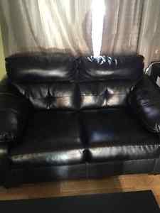 black leather couch and loveseat