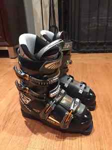 SKI BOOTS VARIOUS SIZES/ 2 SKIS AND BINDINGS/ 2 HELMETS