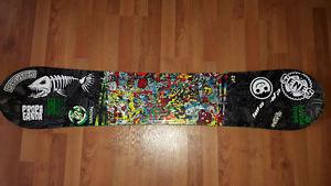 142 K2 Vandal Snowboard and Size 8 DC Boots