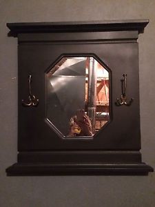 Black mirror with hooks