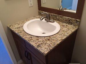 Granite counter with sink and tap