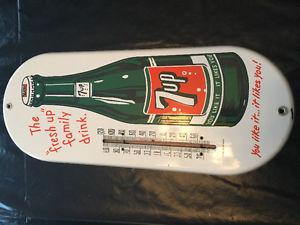 Porcelain 7up thermometer. Sign