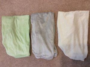 Swaddlers for sleeping and change pad covers