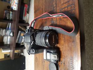 Canon EOS 70D plus 3 lens, battery charger, 2 filters and