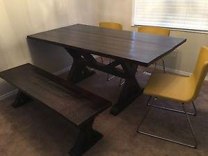Rustic barnwood farmhouse table with matching bench