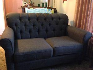 Charcoal fabric loveseat - 1 1/2 years