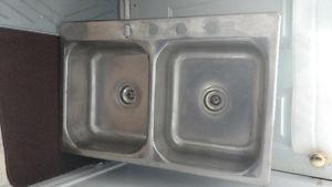 Double stainless steel sink I have two 3 hold or 4