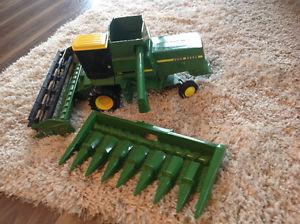 John Deere Combine with a grain and corn header