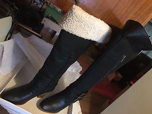 Lined leather thigh high boots NEW never worn.Size6$45
