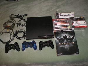 PS3, 3 controllers, 2 charger cords, 16 games