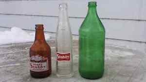 Three vintage pop bottles