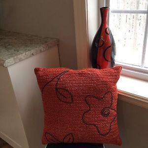 Vase and decorative pillow