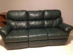 (2)Green leather couch recliners