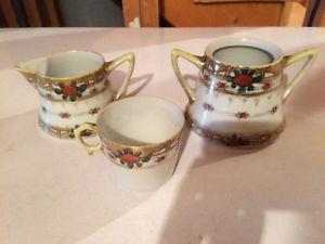 Antique cup, sugar bowl and pitcher