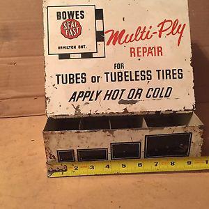 Antique tire repair kit cabinet