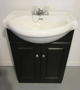 Bathroom sink faucet and cabinet $125 CALL Daniel 