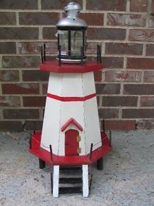 Hand made wooden lighthouse 28 inches high,with working
