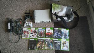XBox 360 with 2 controllers and 11 games