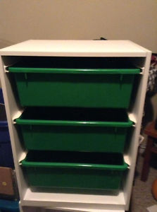 two storage units for sale - white and green