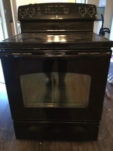 30" GE black, smooth surface electric stove