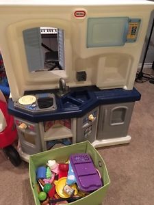 Play kitchen with play food and extras