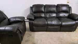Reclining Leather Sofa and Chair paid  selling 700 OBO