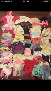 two boxes baby girl clothes