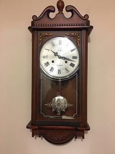 Grandmother clock excellent condition..