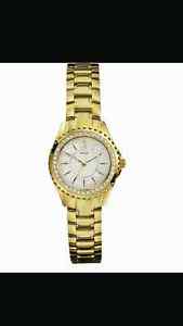 Ladies gold guess watch...never worn