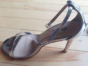 Shiny silver shoes size 6