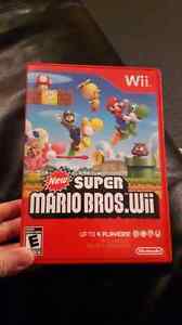 Super mario bros Wii with box manual, excellent cond.