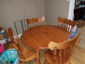 Table, 4 matching chairs with 2 leaves