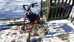 Like new walker/mobility aid with seat.