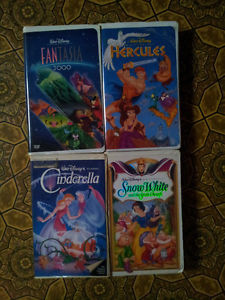 i have 4 disney VHS movies NEED SOLD