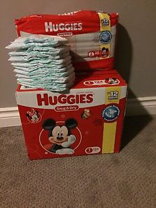 134 size 1 Huggies and 38 size 2 Huggies diapers for sale