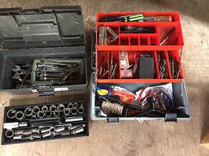 2 tool boxes filled with tools