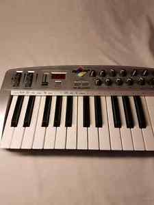 Ozone M audio mini electric keyboard