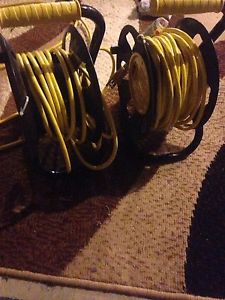 Two extension cord reels