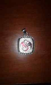 Wanted: Tech N9ne necklace pendant