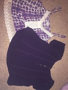2 purple garage shirts
