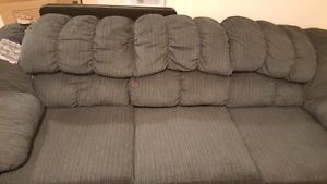Blue couch and love seat in good condition