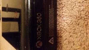 XBOX 360 with two controllers and tons of games