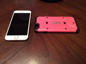 Gold iPhone 6 and pink urban armour gear case