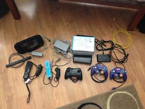 Nintendo Wii U with controllers and games