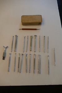 Set of 23 leather stamping tools with case.