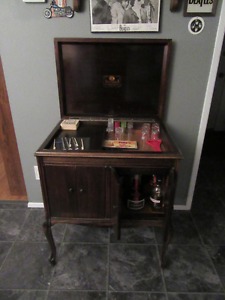 vintage record player cabinet now liquor cabinet