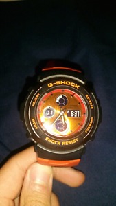 Black and orange G-Shock watch